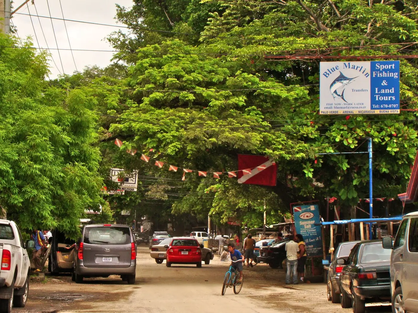 A tree-lined street in downtown Playas del Coco, Costa Rica
